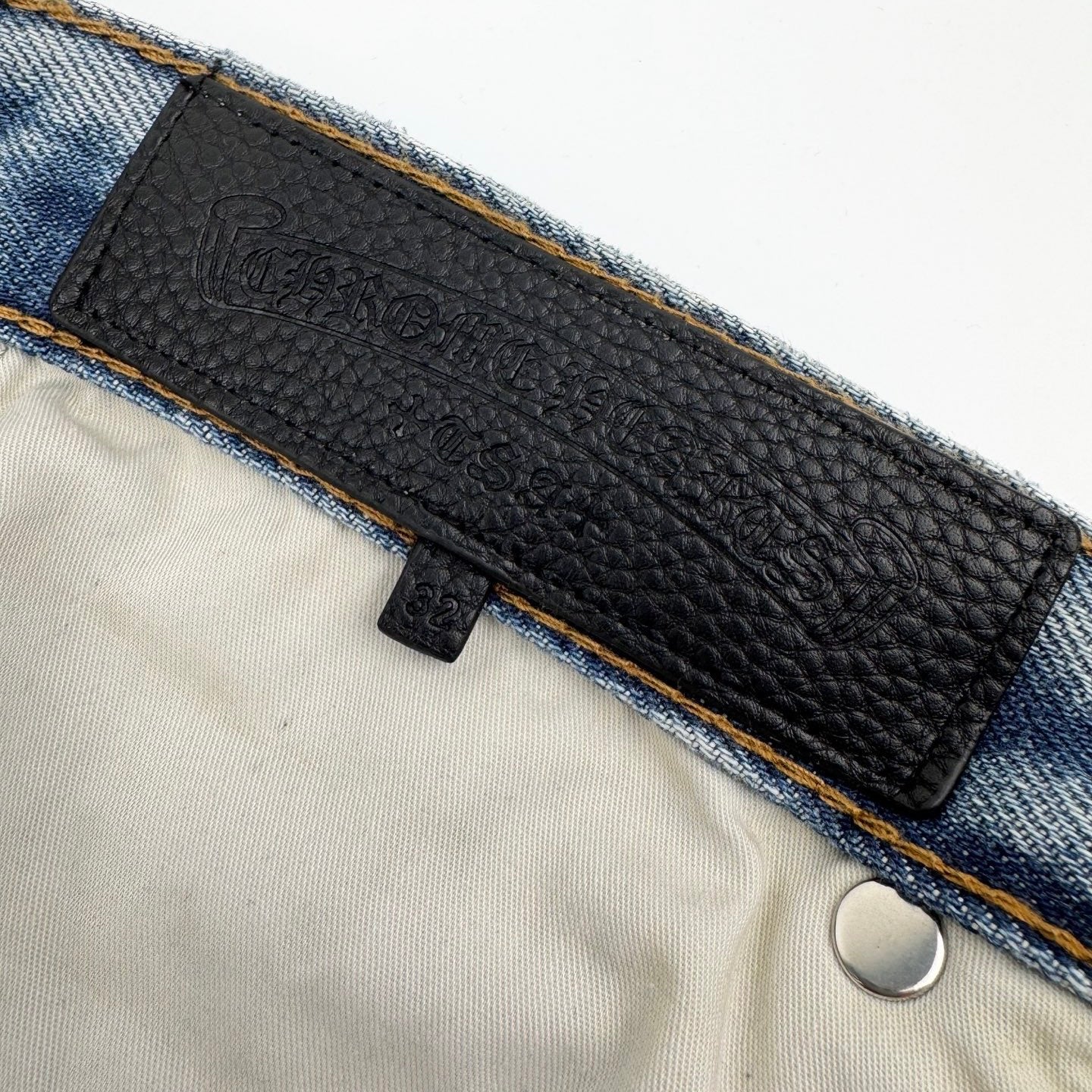 Chrome logo patch jeans