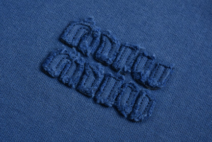 Miu embroidered polo